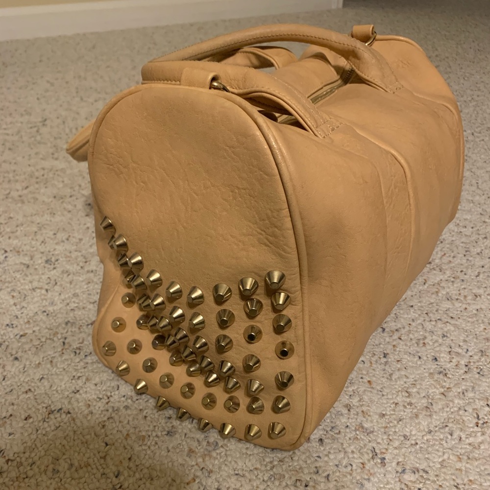 Gold studded tan bag with strap